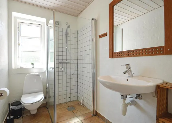 Praestekraven Feriehus Romo